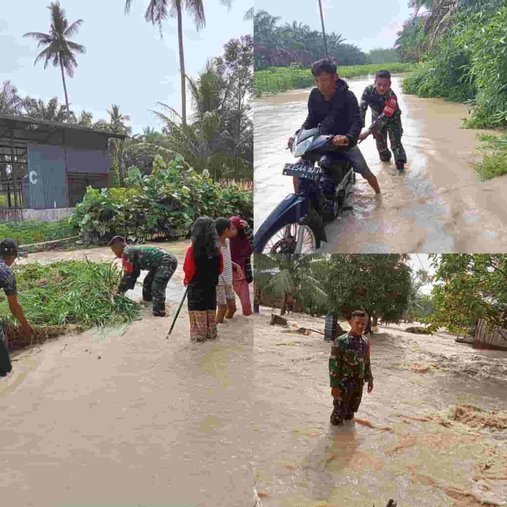 Babinsa Dolok Masihul Siaga di Lokasi Banjir di Bukit Cermin