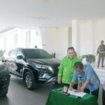 Darma Wijaya Dan Adlin Tambunan Kembalikan Mobil Dinas