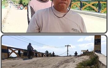 Teks foto : Herman memakai topi didampingi Surya Marantika saat diwawancarai,Sabtu (19/7/2025), terkait kondisi jembatan di Kecamatan Bandar Khalipah,Sergai.