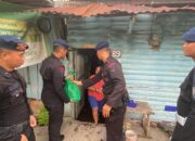 Satuan Brimob Polda Sumut Tebar Kasih di Hari Minggu